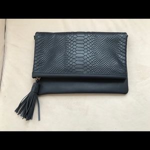 Fold over navy blue faux croc clutch with strap!
